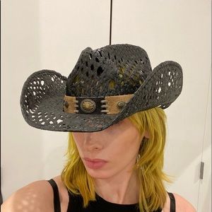 Black cowboy hat with brown leather details